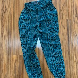 Blue and black stretch "tribal" print pants